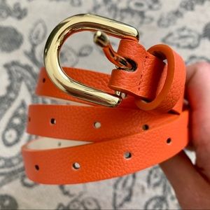 Brand new orange belt with gold buckle S/M